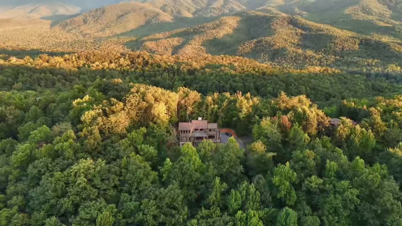 Golden aerial view of the chalet in the Smoky Mountains